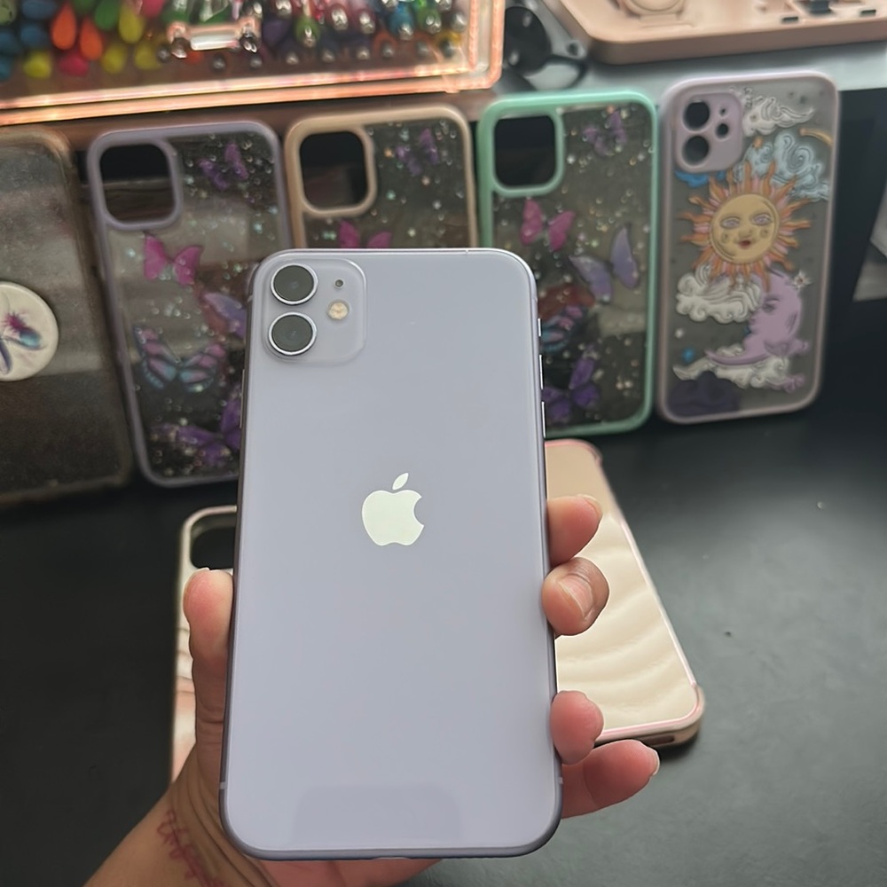 iPhone 11, great condition w/ 5 plus phone cases